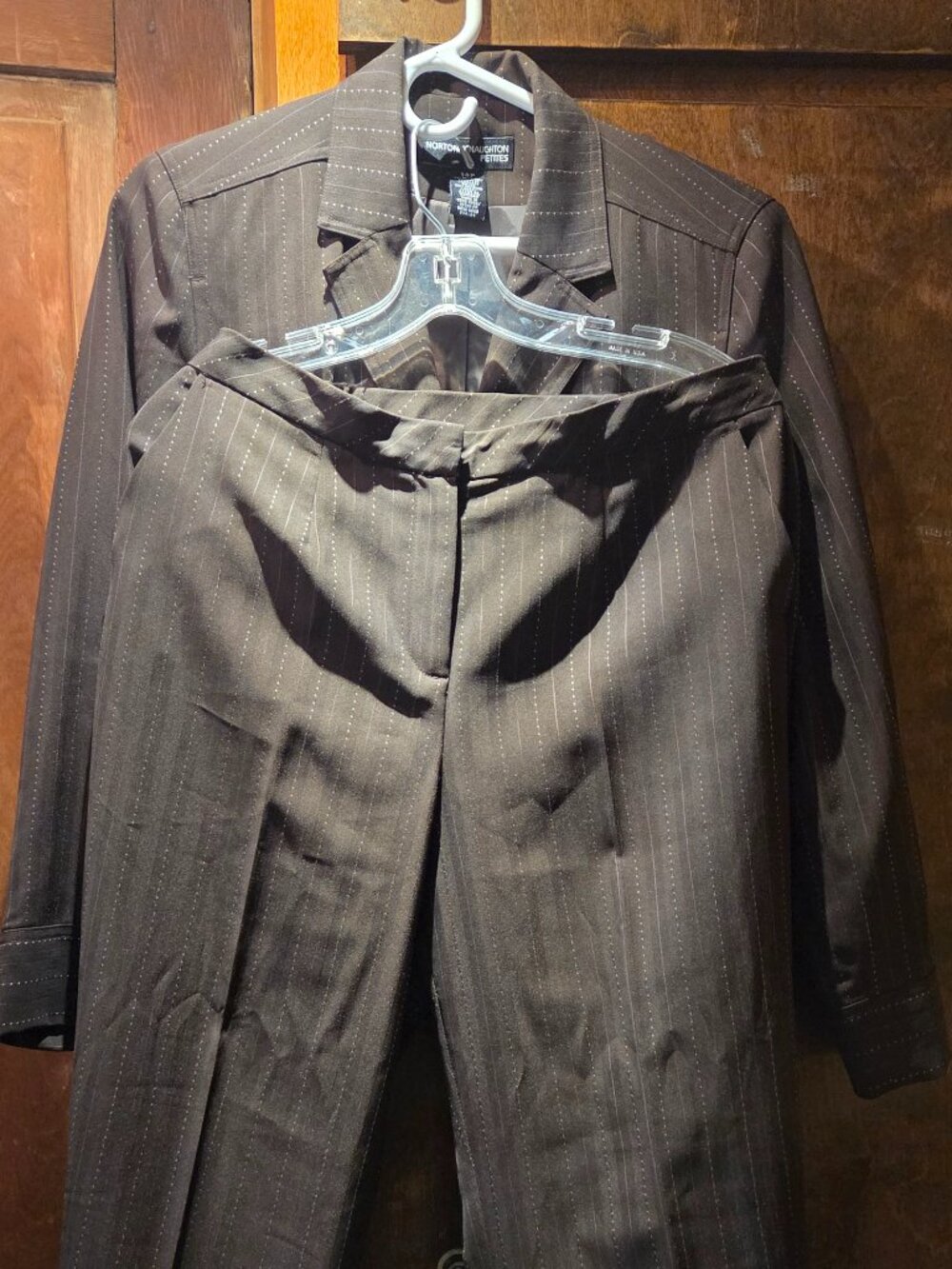 Two-piece women's pinstripe pant suit by the brand Norton McNaughton